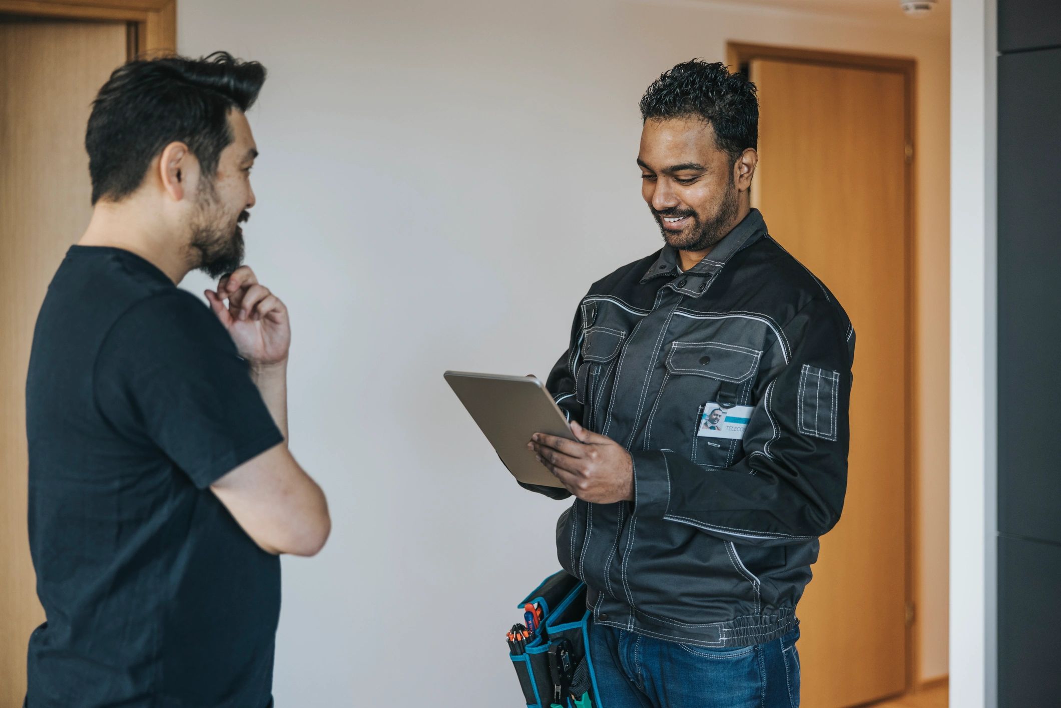 Technician speaking with a customer