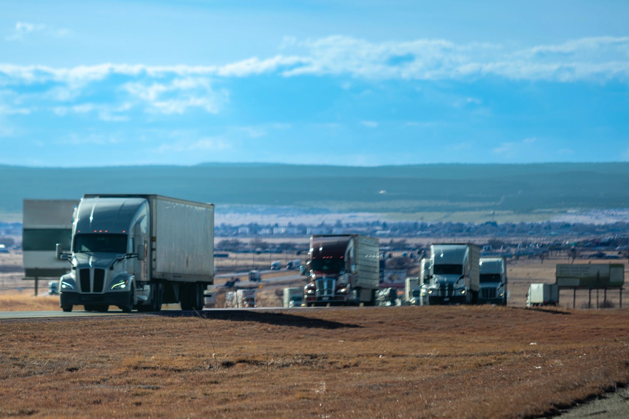 Commercial fuel delivery trucks lined up